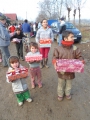 taking their shoeboxes hometo open them